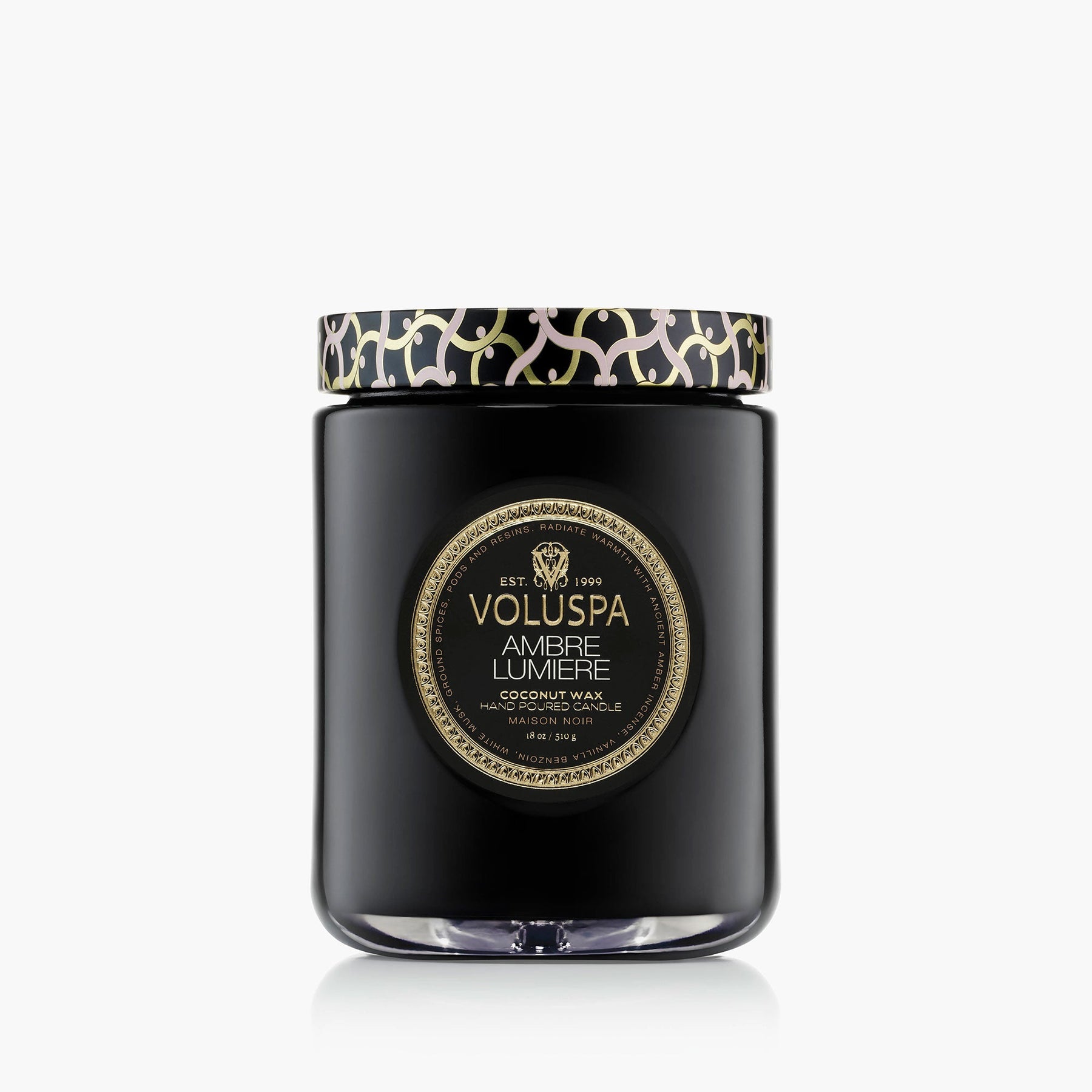 Ambre Lumiere large jar candle with a decorative Maison lattice embossed tin lid, branded by Voluspa, with the scent Ambre Lumiere.